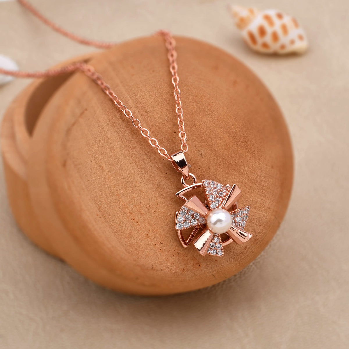 Rotating Rosy Glow Diamond Necklace