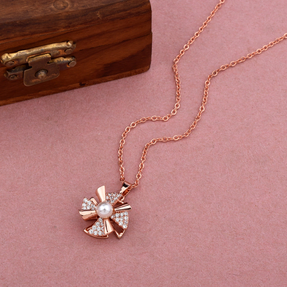Rotating Rosy Glow Diamond Necklace